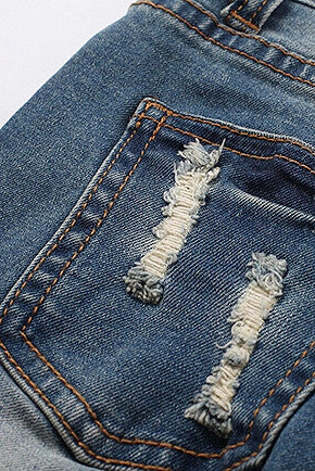 Stretch destroyed denim