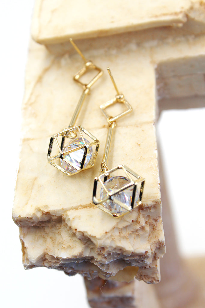 golden prismatic pendant earrings