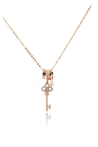 Crystal circle mini cross necklace