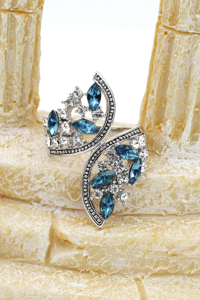 elegant symmetry crystal ring