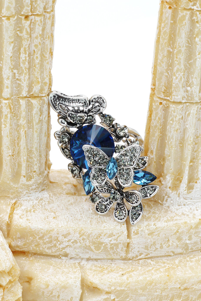 elegant crystal butterfly and flower ring