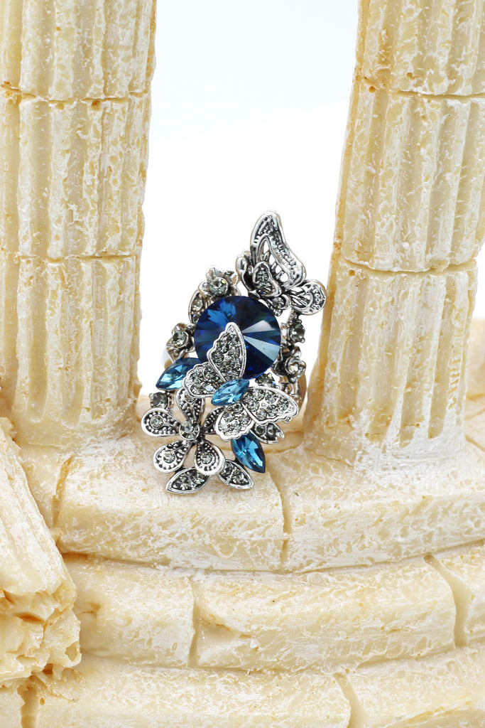 elegant crystal butterfly and flower ring
