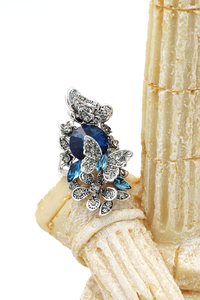 elegant crystal butterfly and flower ring