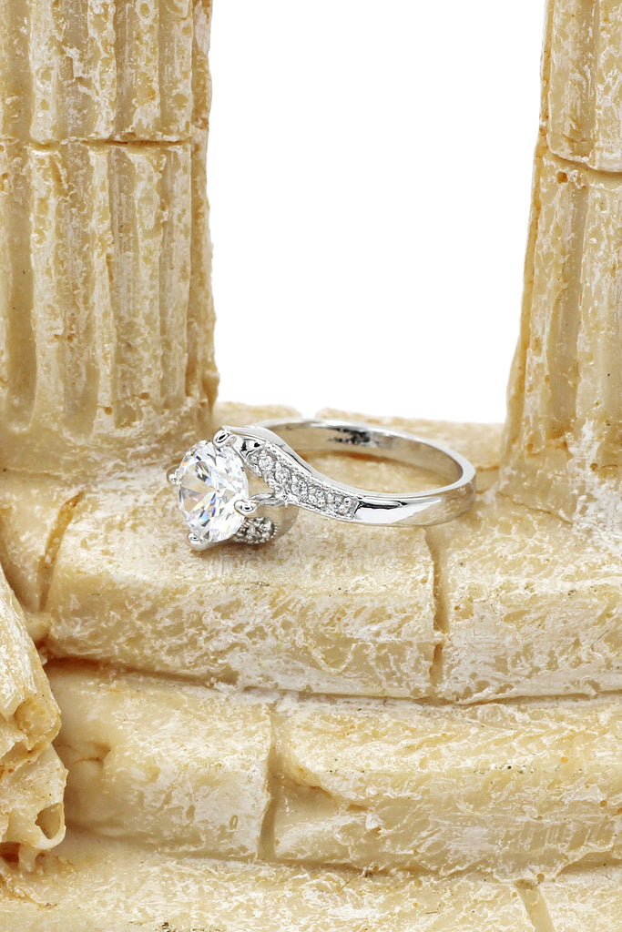 four grabbed twisted arm crystal ring