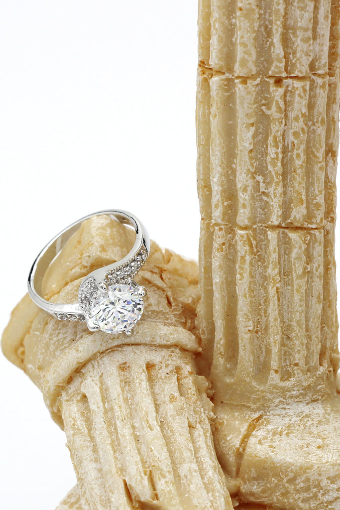 four grabbed twisted arm crystal ring