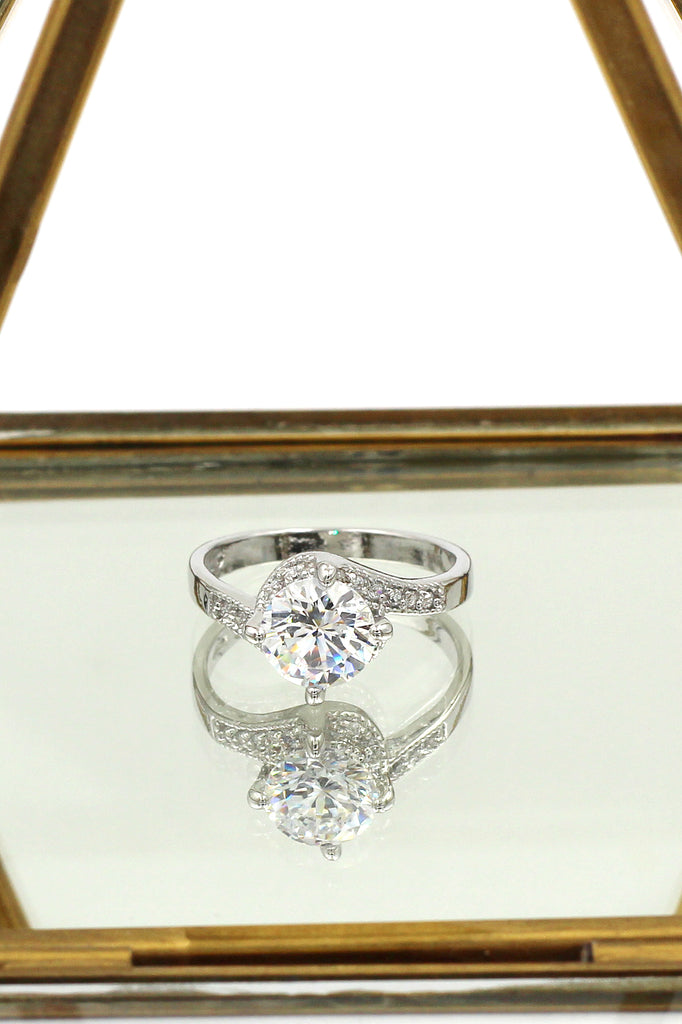 four grabbed twisted arm crystal ring