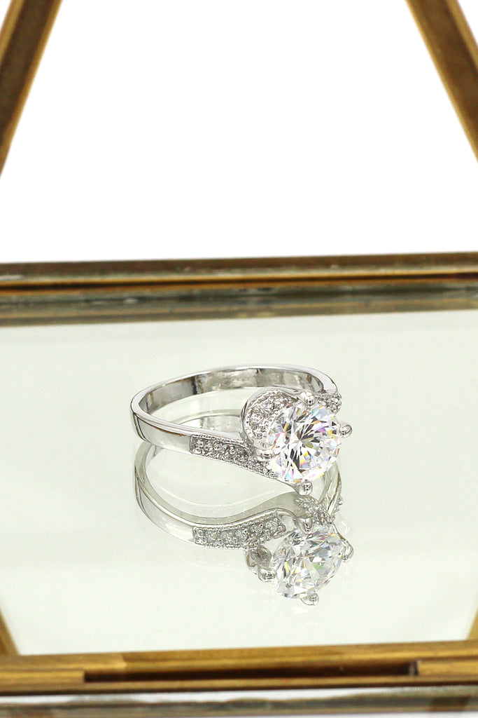 four grabbed twisted arm crystal ring