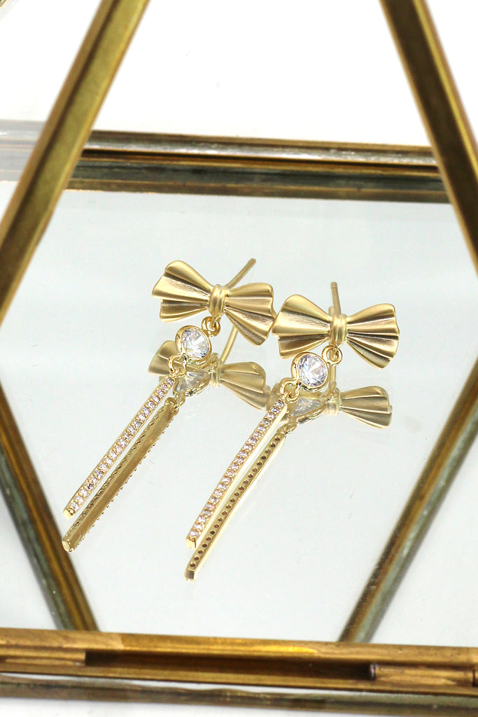 bow tassel flashing crystal earrings