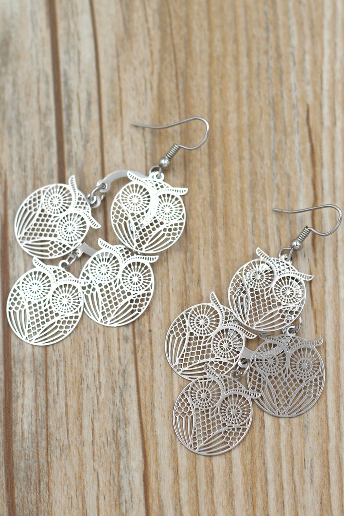 Elegant long owl earrings