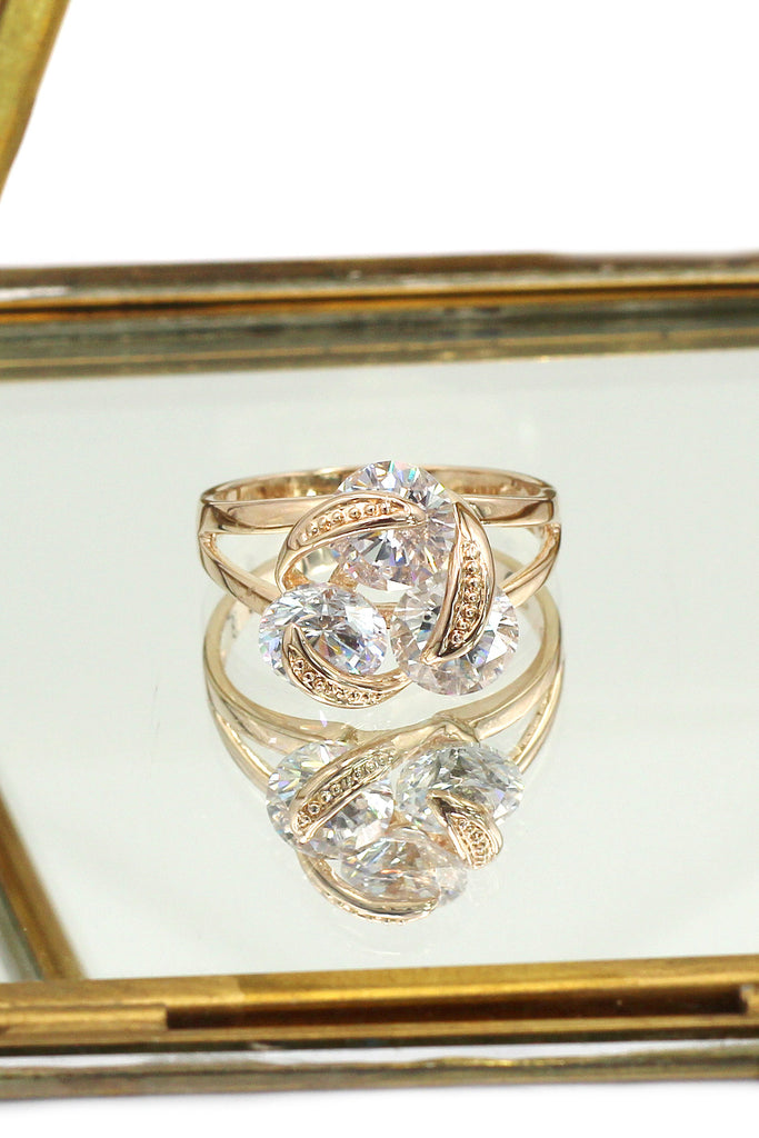 elegant rotating crystal gold ring