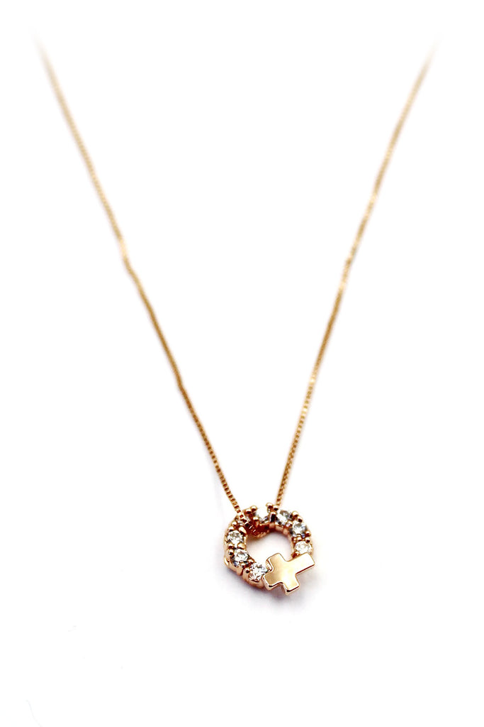 Crystal circle mini cross necklace