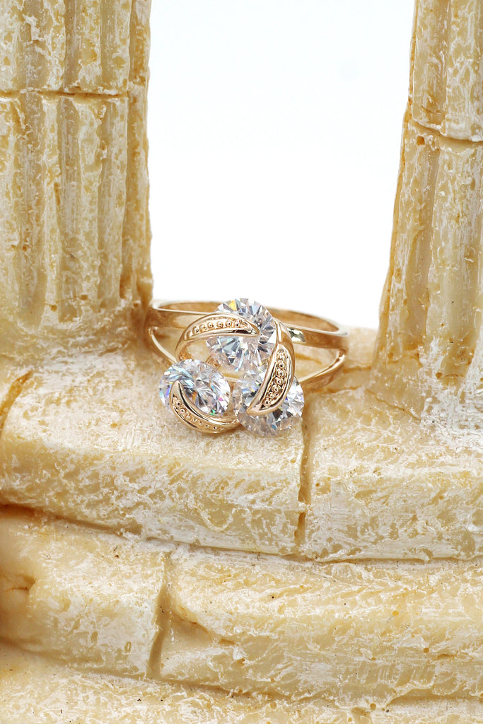 elegant rotating crystal gold ring