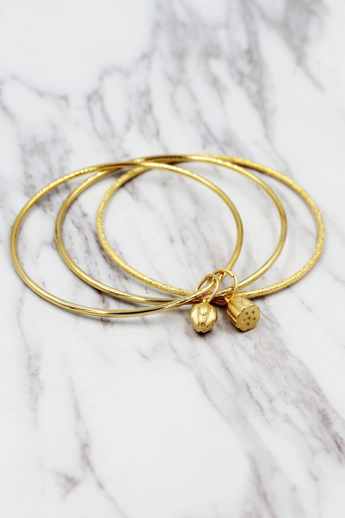 Elegant lotus pendant bracelet