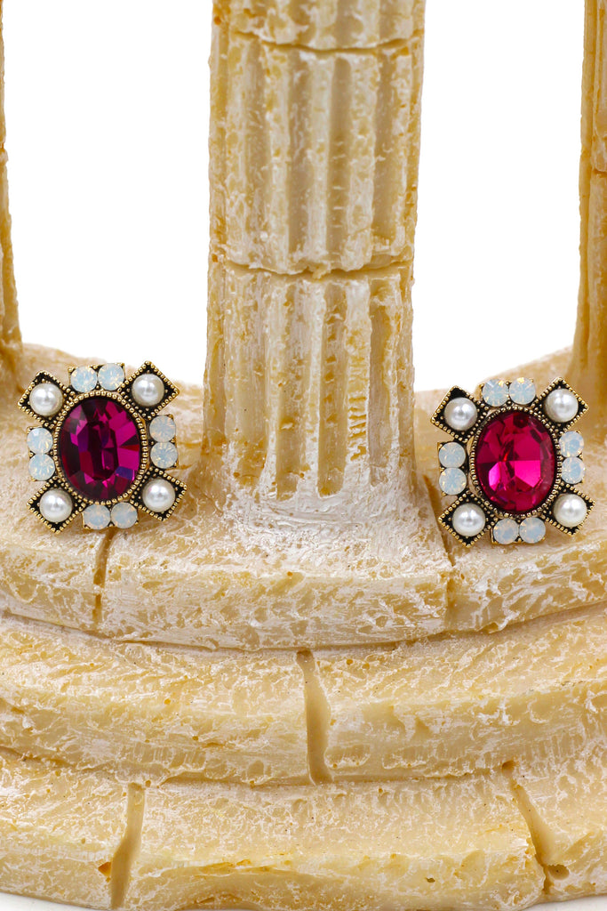 elegant colour crystal and pearl gold rim earrings