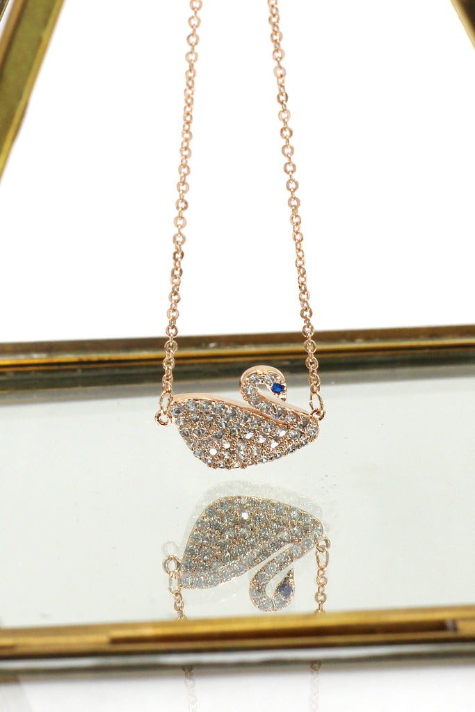 delicate blue eyes crystal swan necklace