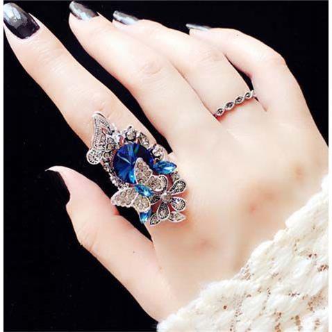 elegant crystal butterfly and flower ring