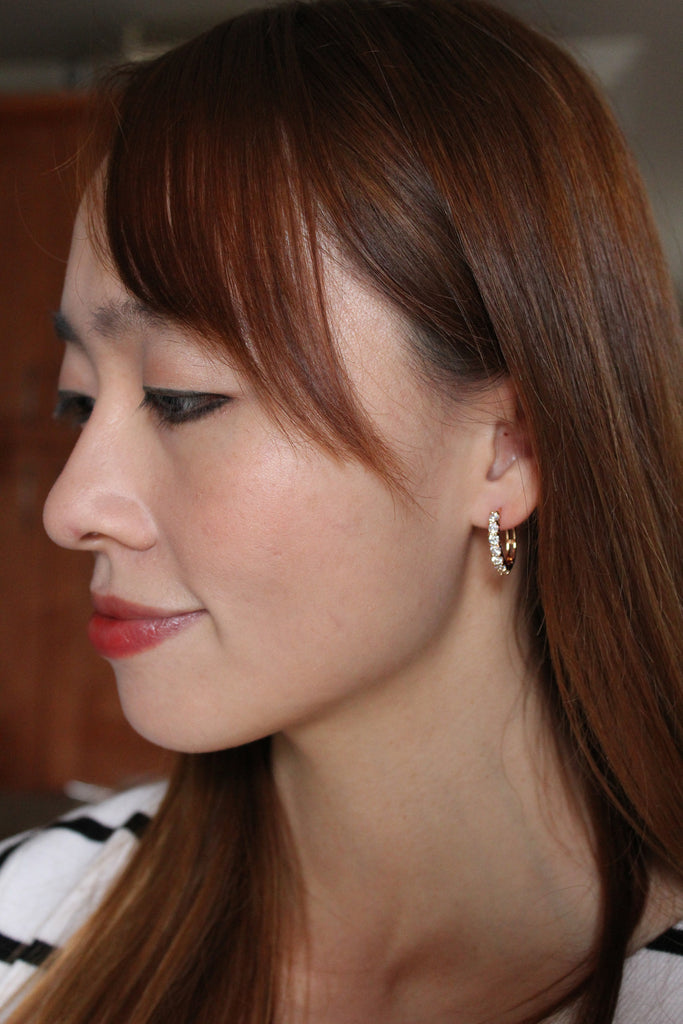 noble golden ring small crystal earrings