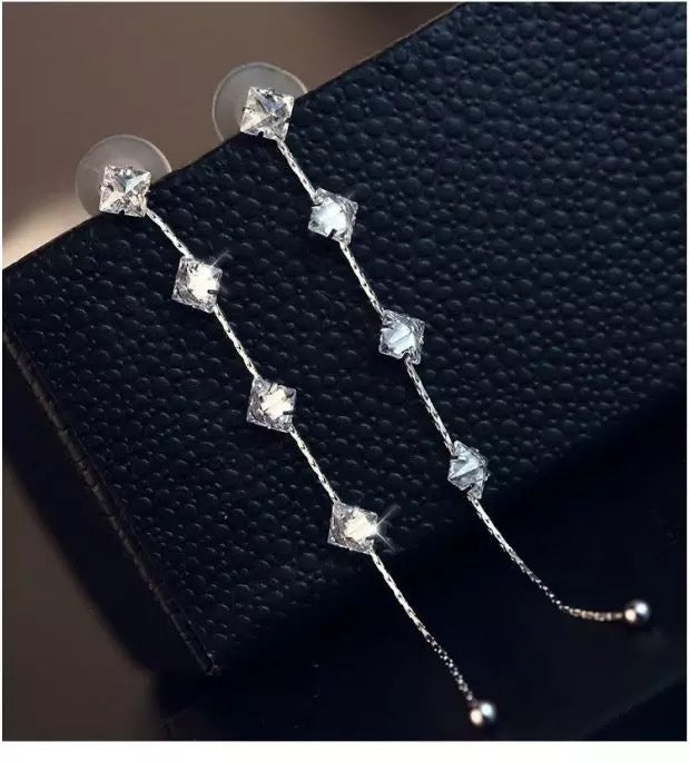 delicate long fringe earrings