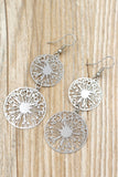 Hollow carved round metal earrings
